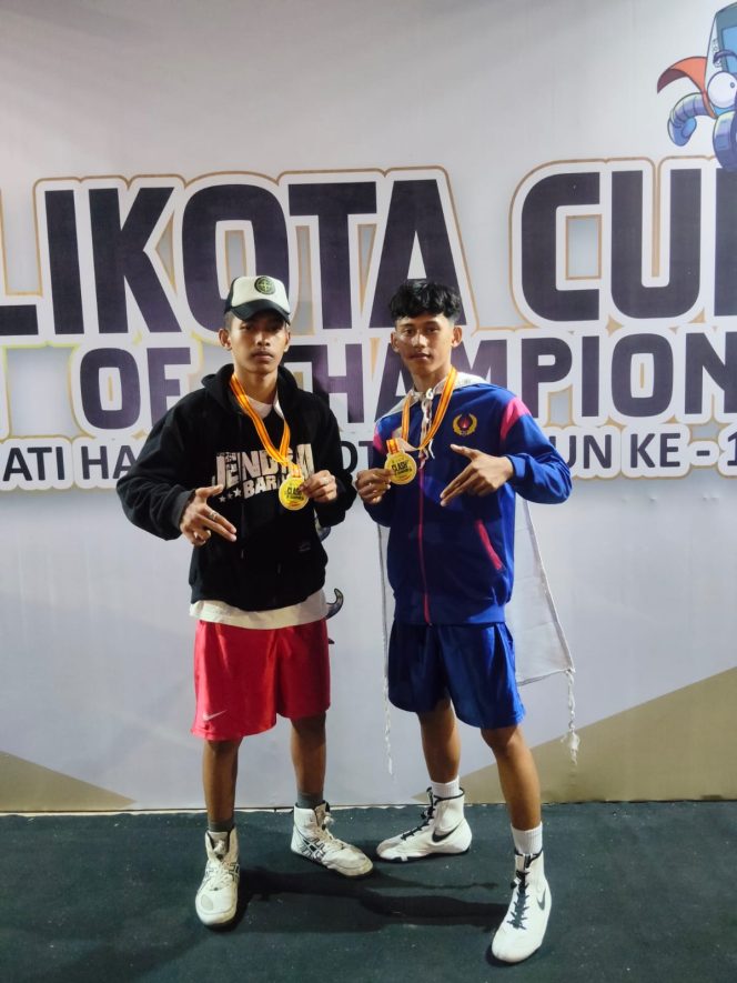 
 Purwo Agung Maeraldi Utama dan Rahmat Putra Maulana,Siswa SMAN 5 Jember Juara 1 Kejuaraan Tinju Amatir Provinsi Jawa Timur